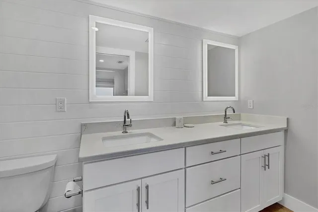 a bathroom with a sink and a toilet