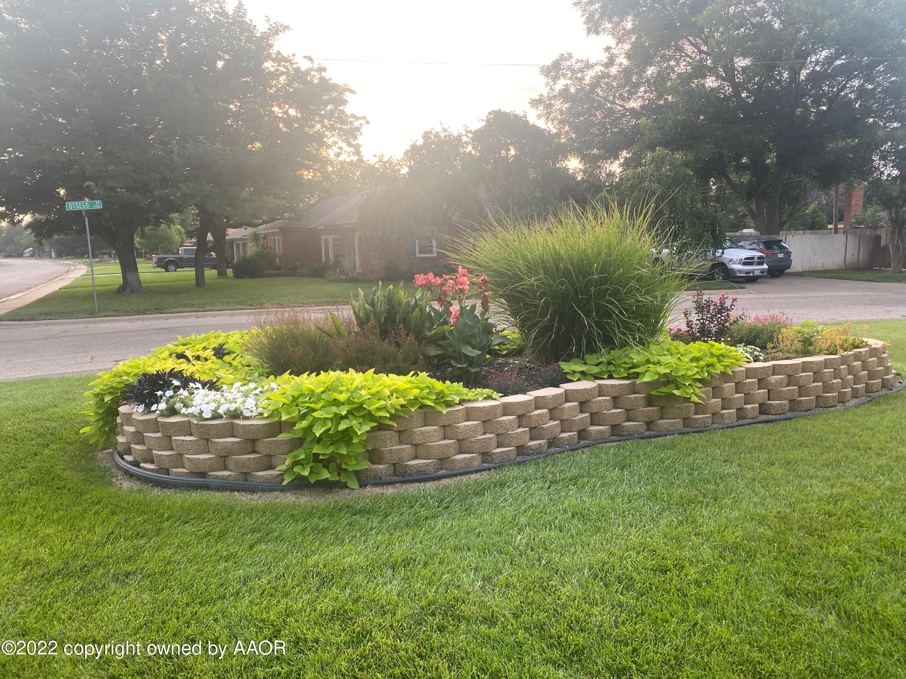 6301 Dreyfuss Road Amarillo, TX 79106 - Photo 2 of 34 a view of a table and chair in the garden