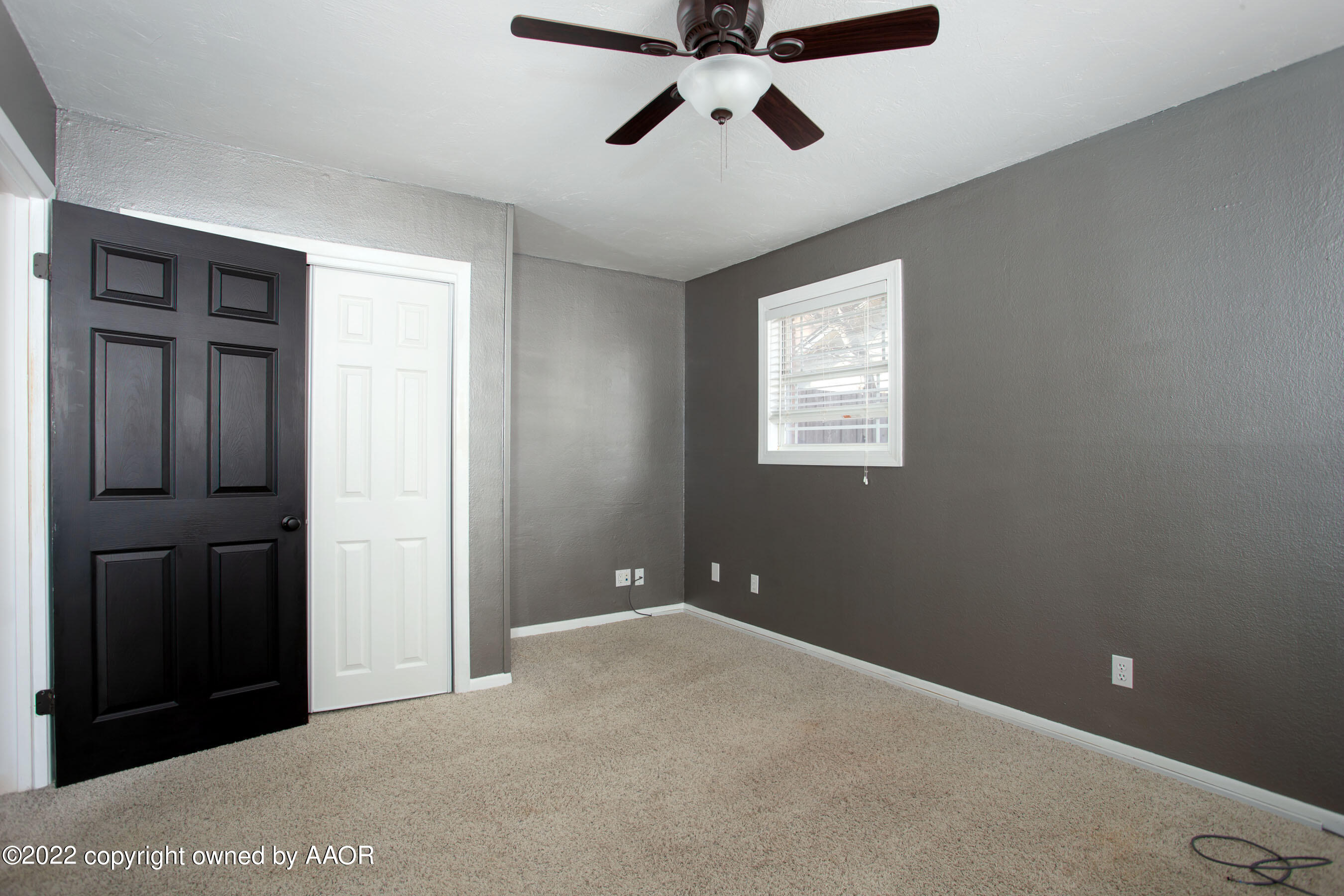 6301 Dreyfuss Road Amarillo, TX 79106 - Photo 23 of 34 a view of an empty room with a window