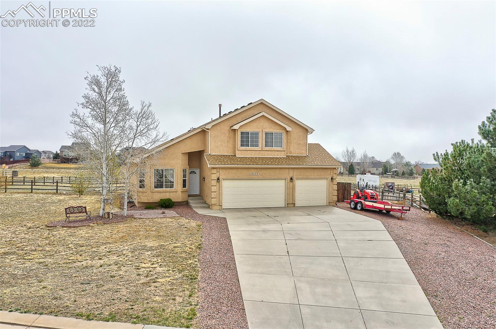 8911 Tompkins Road Peyton, CO 80831 - Photo 1 of 27 Gallery Image 1