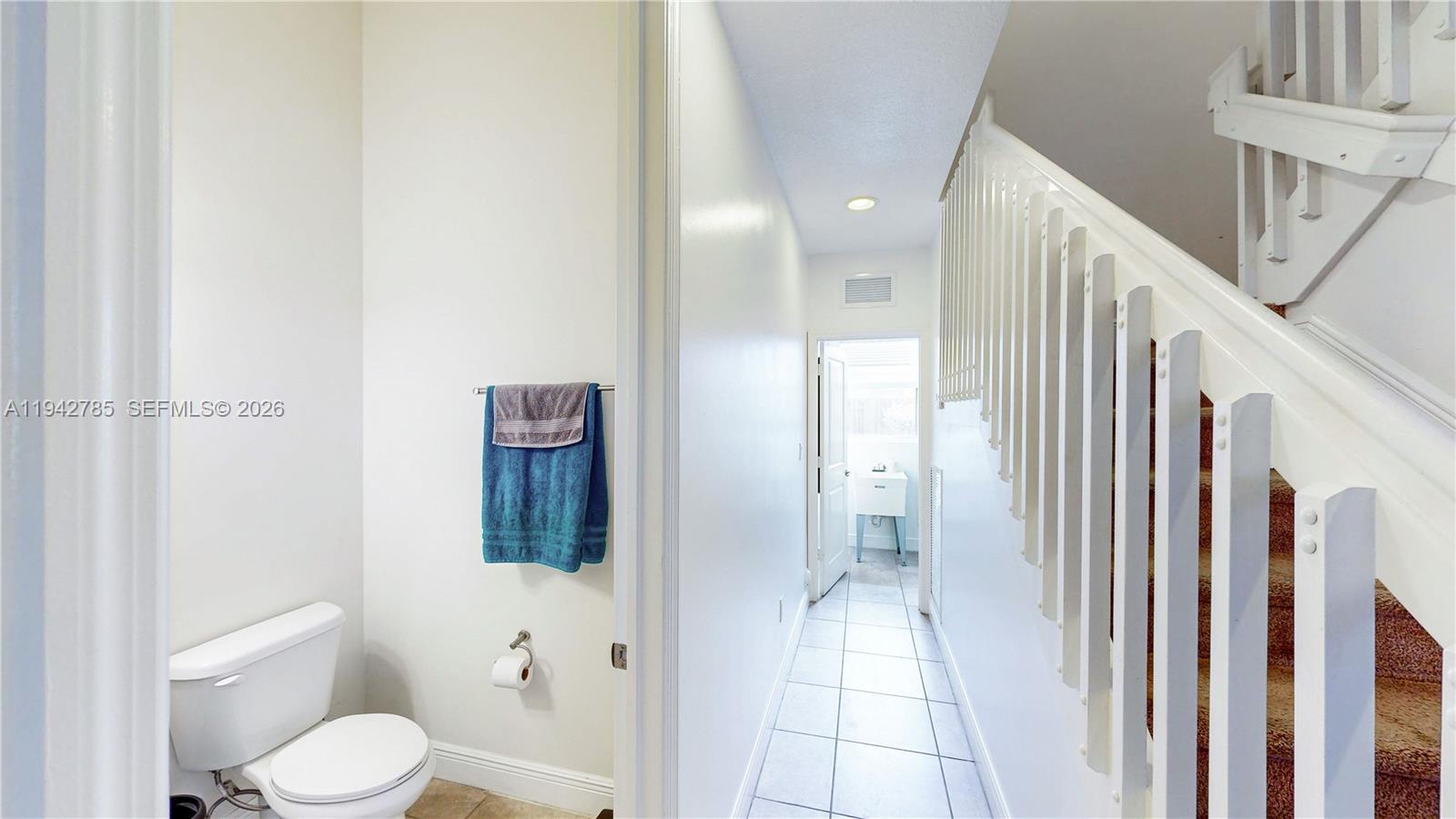 231 Northeast 33rd Terrace Homestead, FL 33033 - Photo 35 of 87 a bathroom with a toilet and a shower