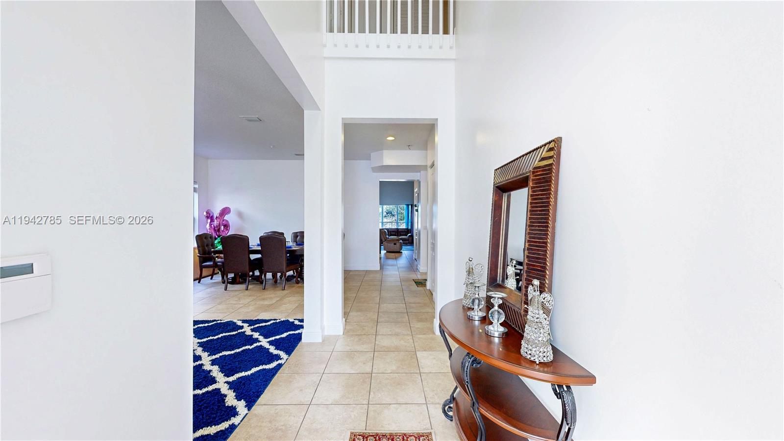 231 Northeast 33rd Terrace Homestead, FL 33033 - Photo 4 of 87 a view of living room with furniture and white walls