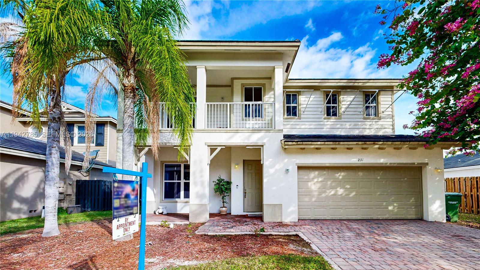 231 Northeast 33rd Terrace Homestead, FL 33033 - Photo 55 of 87 a front view of a house with a garden