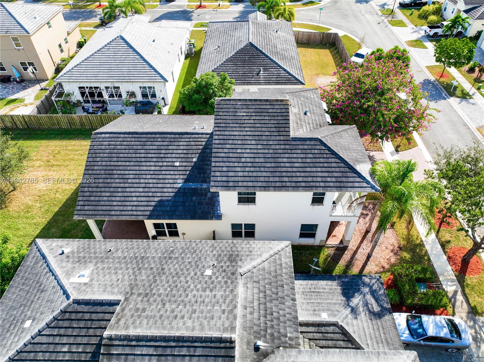 231 Northeast 33rd Terrace Homestead, FL 33033 - Photo 64 of 87 front view of a house with a yard