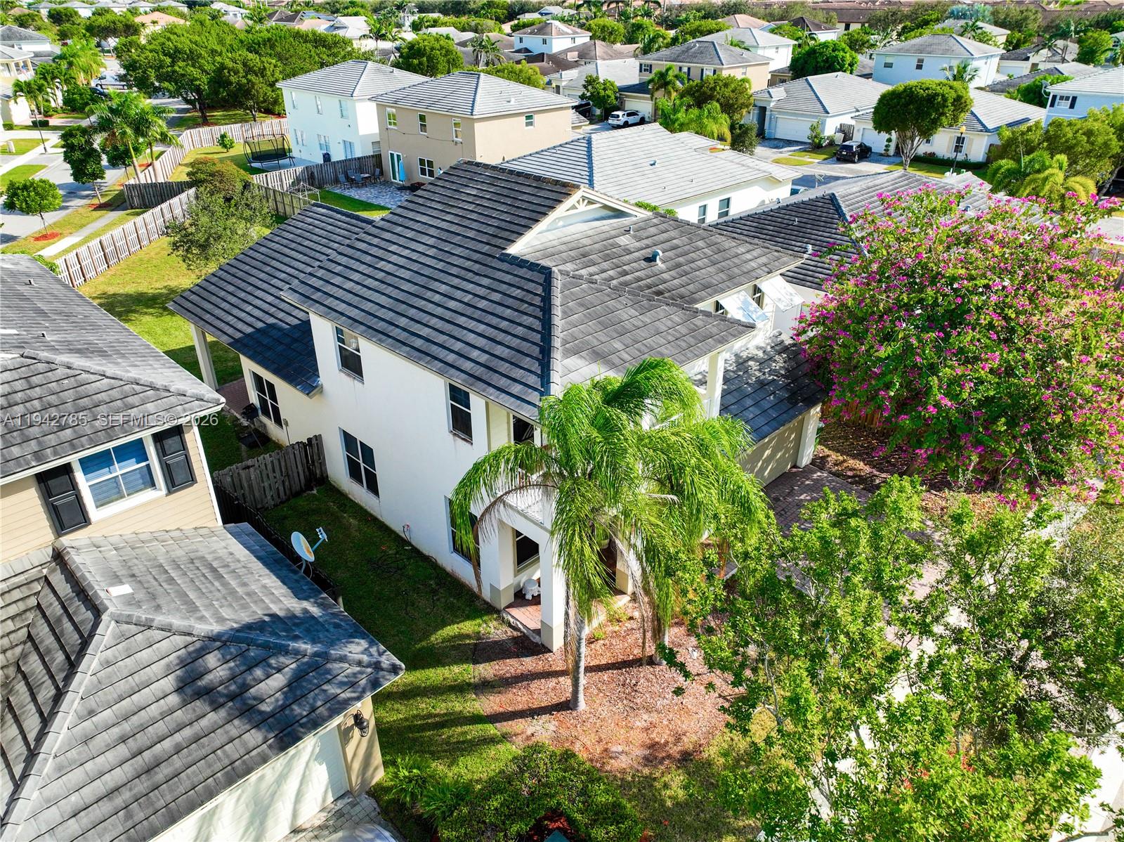 231 Northeast 33rd Terrace Homestead, FL 33033 - Photo 65 of 87 an aerial view of a house with a yard