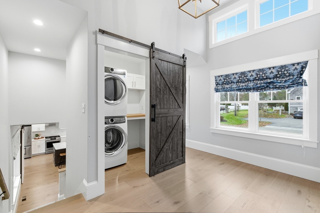 178 Hersey Street Hingham, MA 02043 - Photo 16 of 23 a utility room with dryer and washer