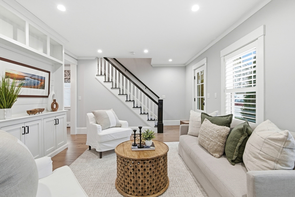 178 Hersey Street Hingham, MA 02043 - Photo 2 of 23 a living room with furniture and a large window