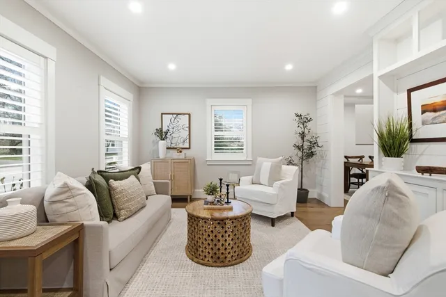 a living room with furniture or couch and a flat screen tv