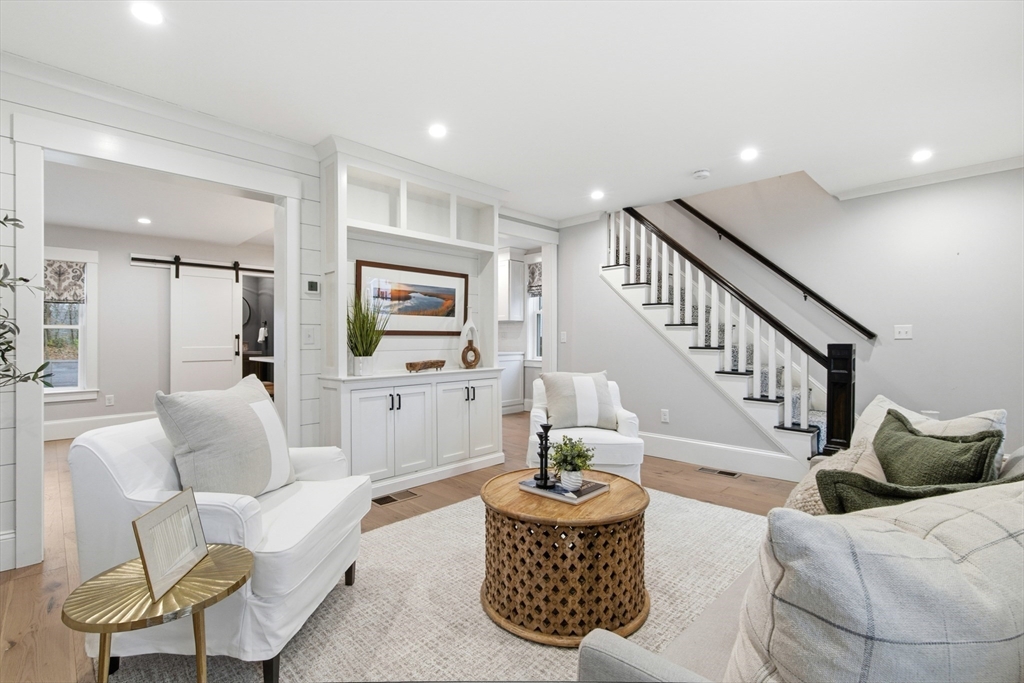 178 Hersey Street Hingham, MA 02043 - Photo 4 of 23 a living room with furniture and a wooden floor