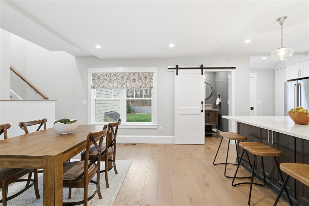 178 Hersey Street Hingham, MA 02043 - Photo 7 of 23 a view of a dining room with furniture and window