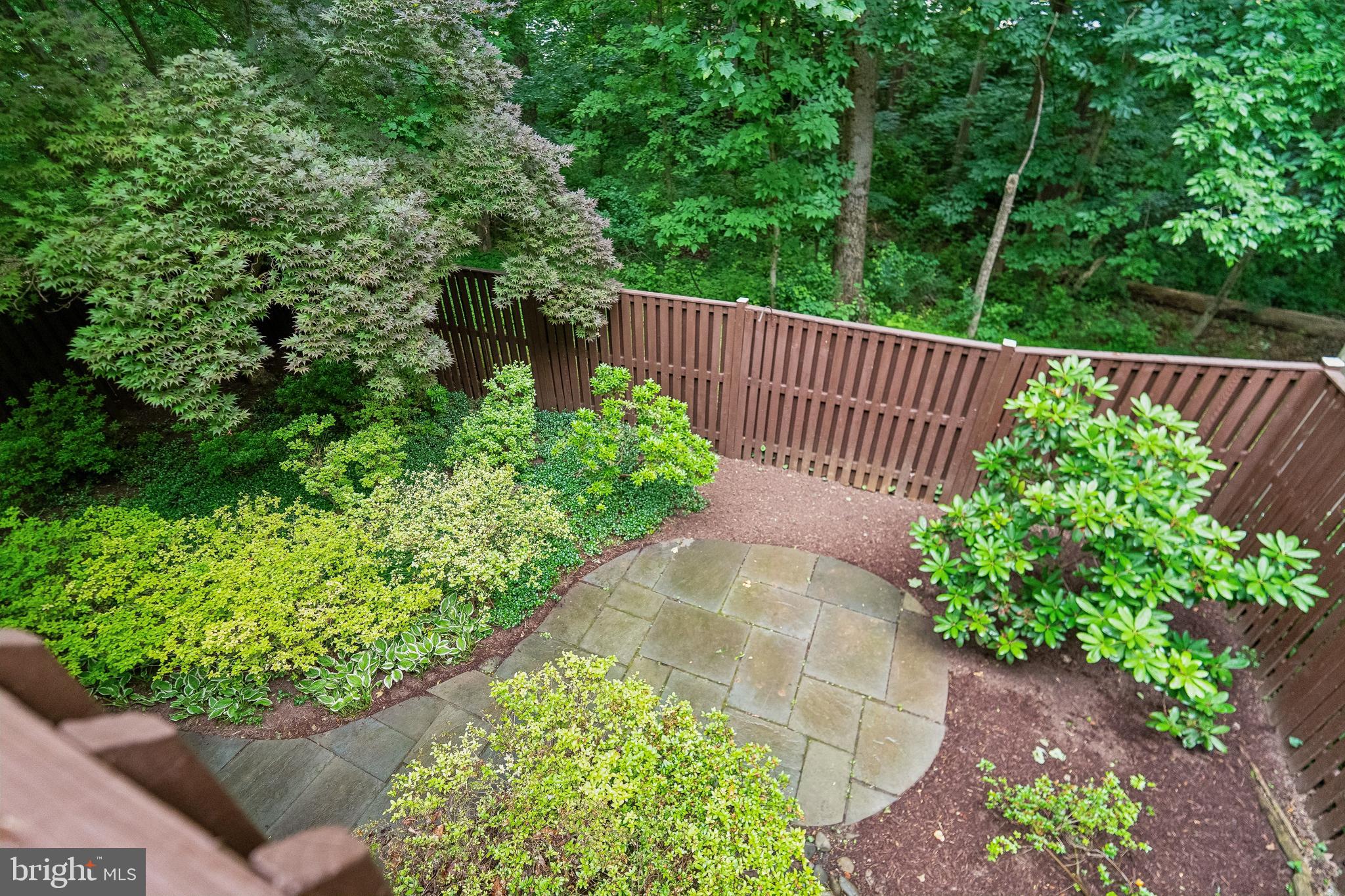 2 Tivoli Lake Court Silver Spring, MD 20906 - Photo 5 of 40 Deck Looks down on fenced, landscaped back yard