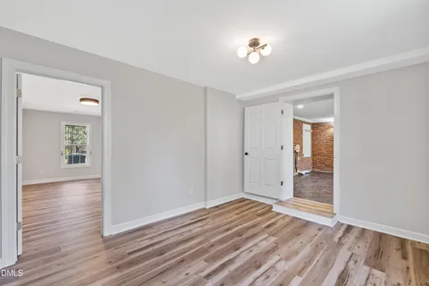 a view of a livingroom with a chandelier fan