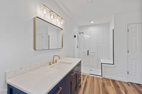 a view of a backyard with a large tree