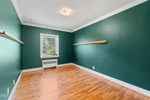 a house view with swimming pool in front of it