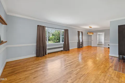 a view of kitchen with furniture and flat screen tv
