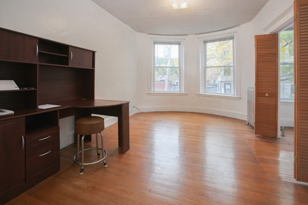 7-9 University Road Brookline, MA 02445 - Photo 13 of 17 a view of a workspace with furniture and a window