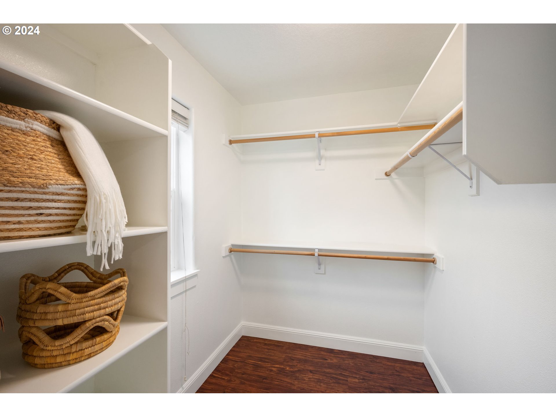 1186 Northeast 106th Avenue Portland, OR 97220 - Photo 14 of 22 a view of walk in closet with clothes and shoes