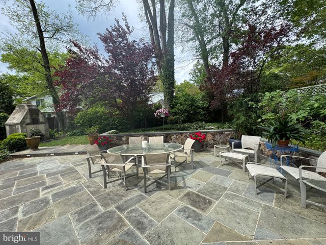 a outdoor space with lots of tables and chairs