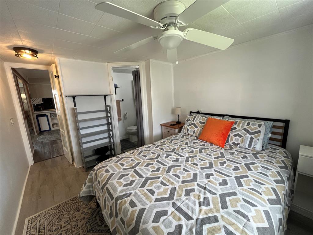 1910 Southwest 85th Terrace Davie, FL 33324 - Photo 15 of 22 a bedroom with a bed and a mirror