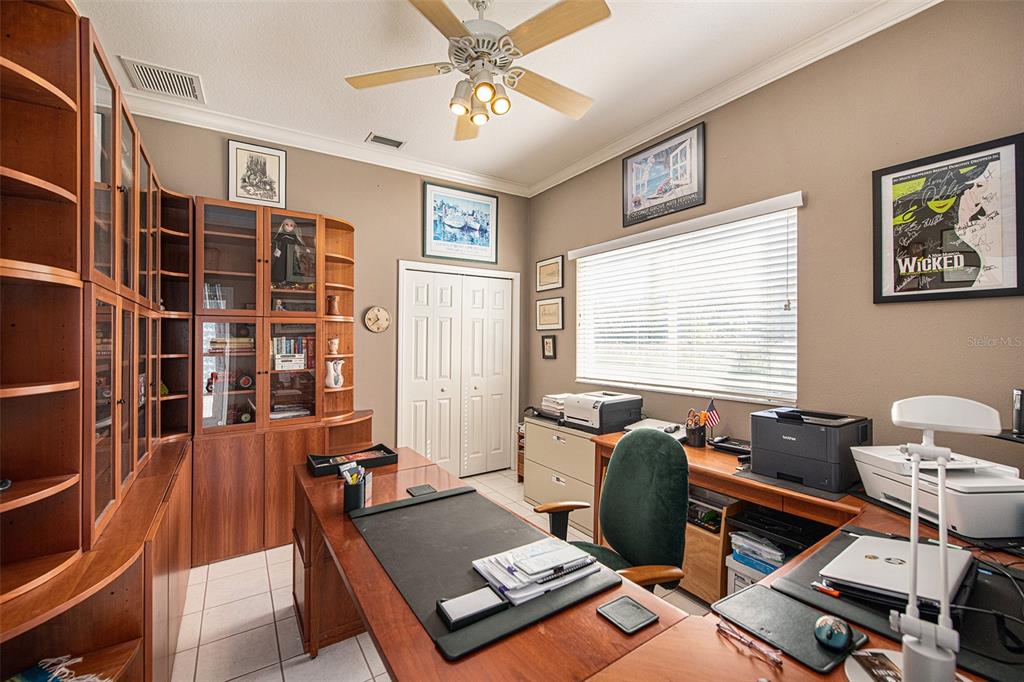 331 Lewis Road Lithia, FL 33547 - Photo 26 of 87 a living room with furniture and a window