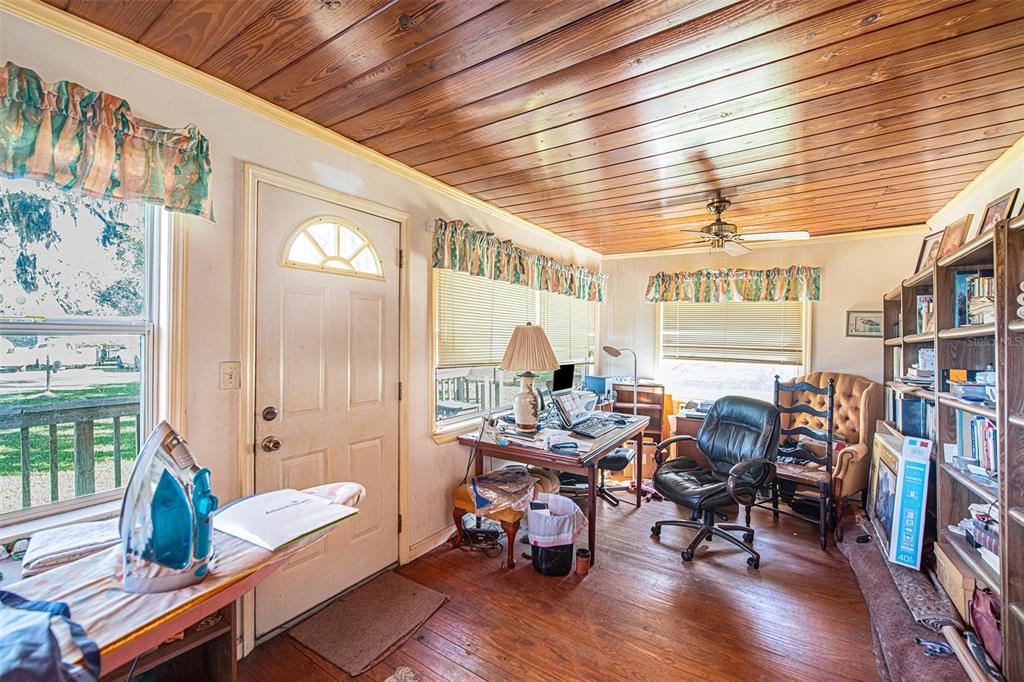 331 Lewis Road Lithia, FL 33547 - Photo 39 of 87 a living room with furniture and a large window