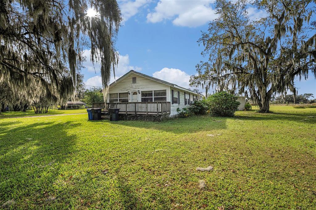 331 Lewis Road Lithia, FL 33547 - Photo 46 of 87 a view of a house with a yard