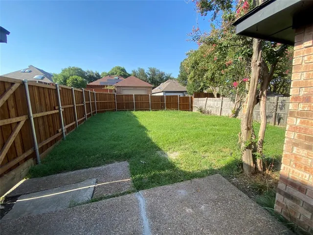 a view of a porch with a yard