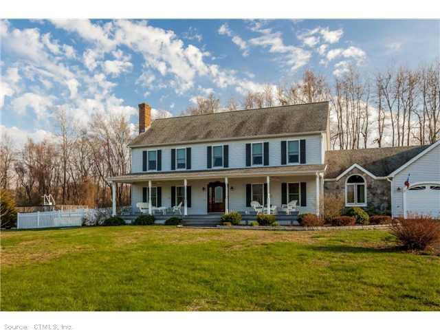 26 R Mauro Drive Durham, CT 06422 - Photo 1 of 1 a front view of a building with a garden