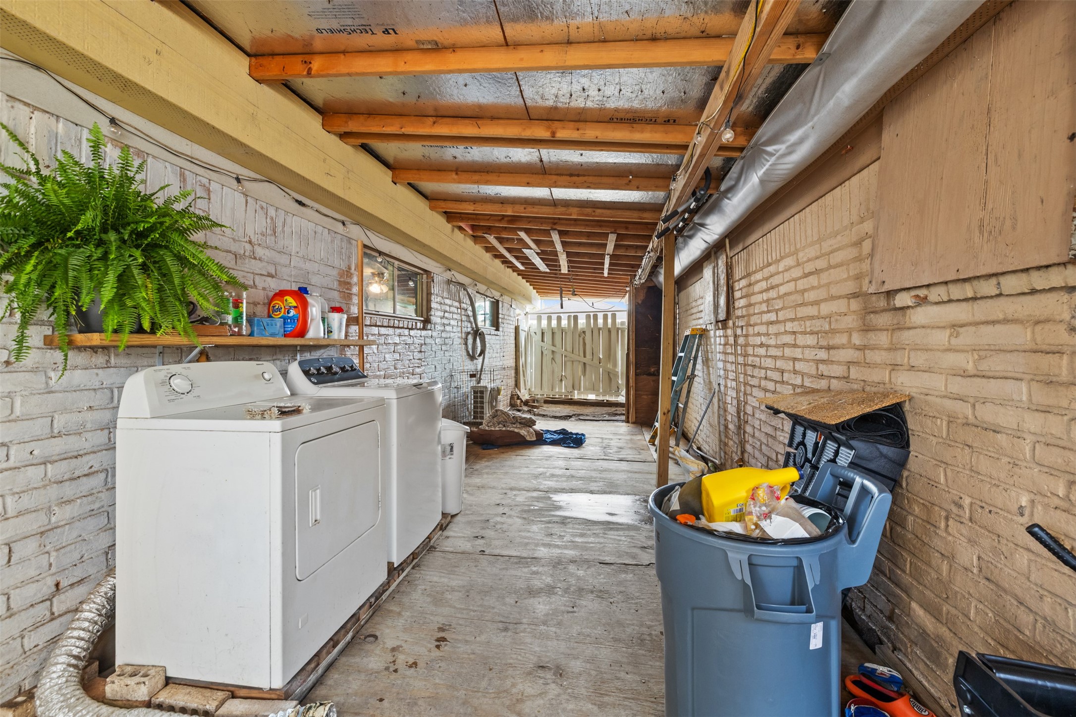 3367 Sadler Street Houston, TX 77093 - Photo 13 of 25 a utility room with dryer and washer
