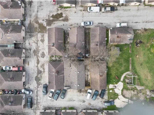 a aerial view of multi story residential apartment building