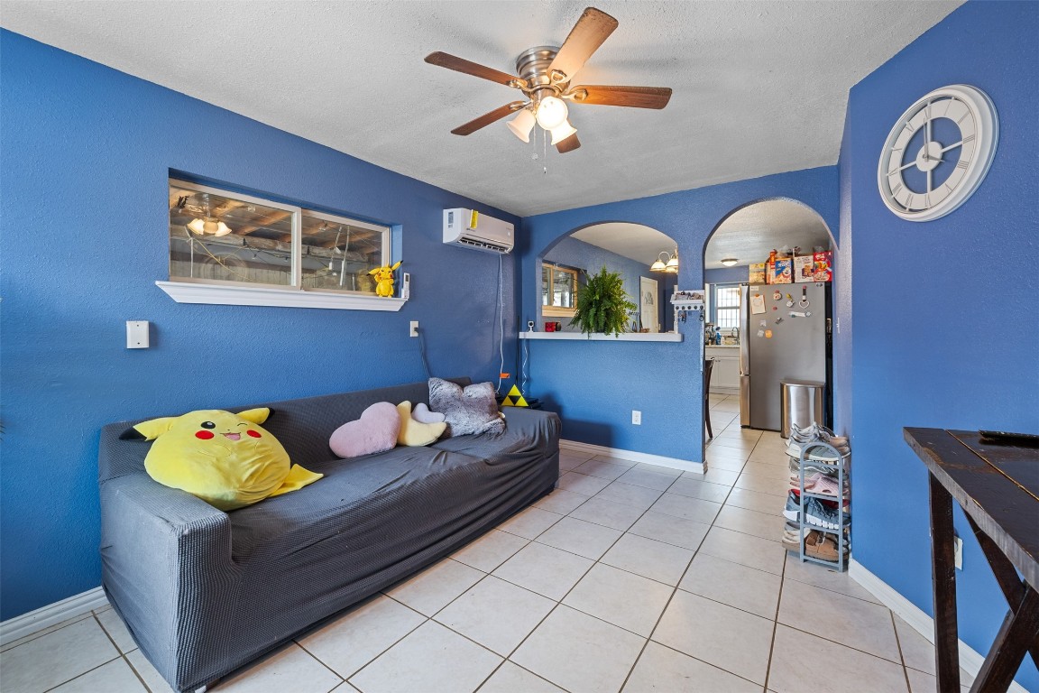 3367 Sadler Street Houston, TX 77093 - Photo 2 of 25 a living room with granite countertop furniture and a window