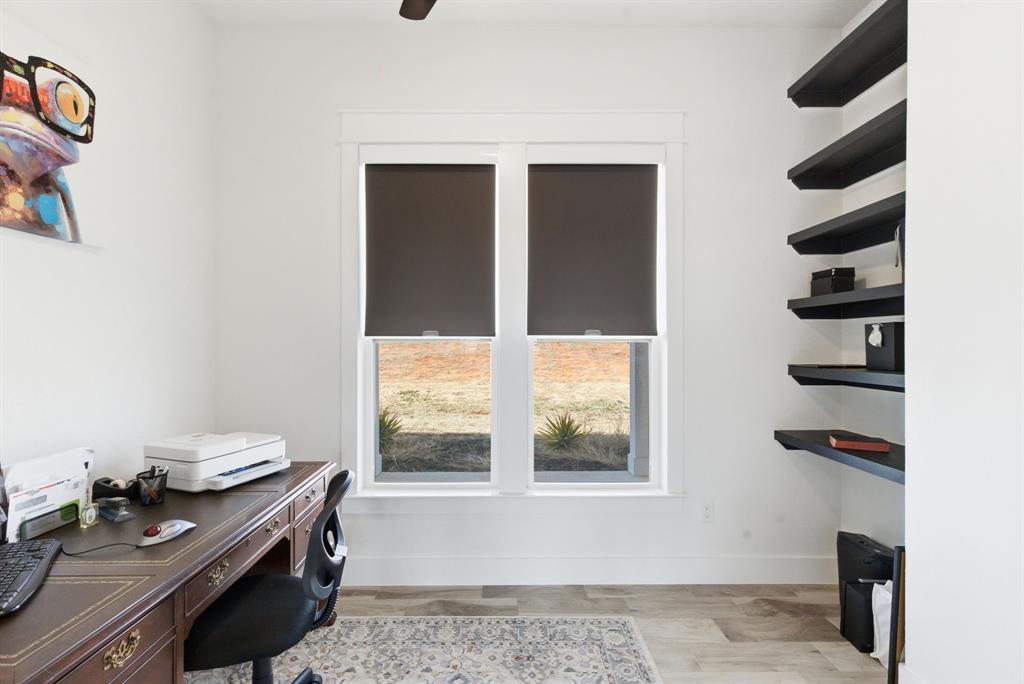 1024 Agnes North Springtown, TX 76082 - Photo 25 of 36 a view of a kitchen with a sink