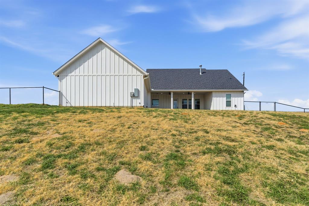 1024 Agnes North Springtown, TX 76082 - Photo 36 of 36 a house with yard in front of it