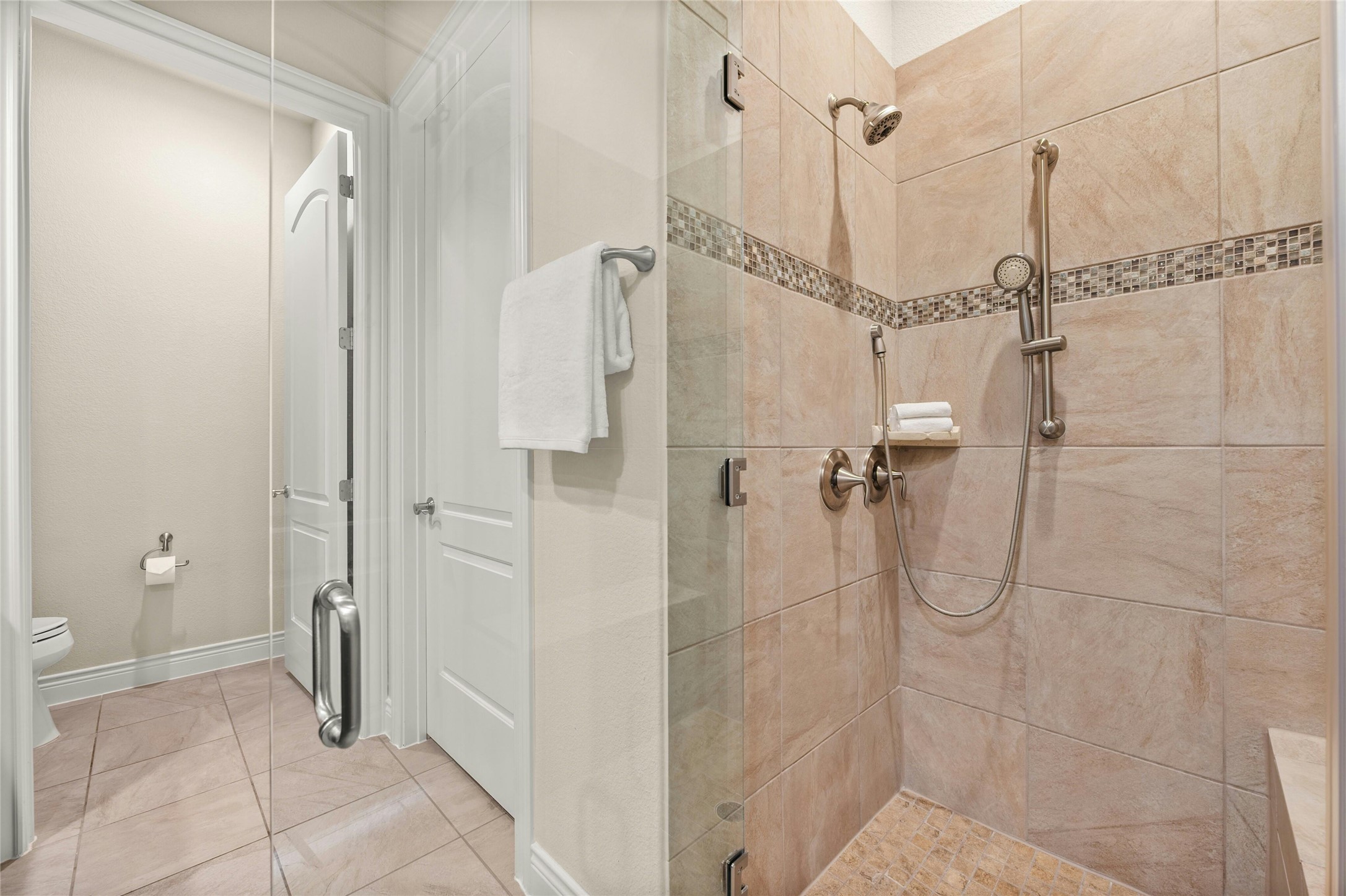 103 Rivalto Circle, Unit 3 Lakeway, TX 78734 - Photo 19 of 30 a bathroom with a shower