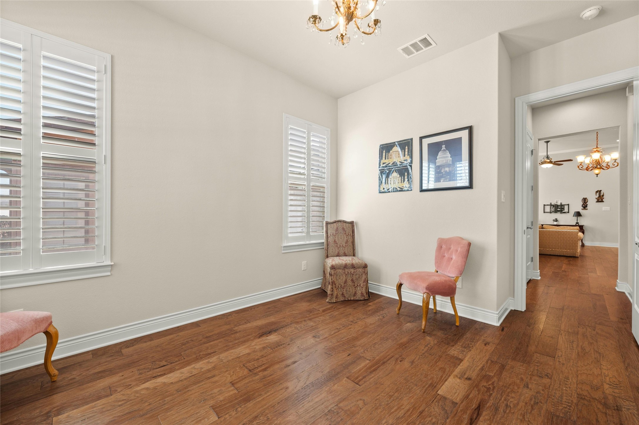 103 Rivalto Circle, Unit 3 Lakeway, TX 78734 - Photo 22 of 30 a living room with furniture and a window