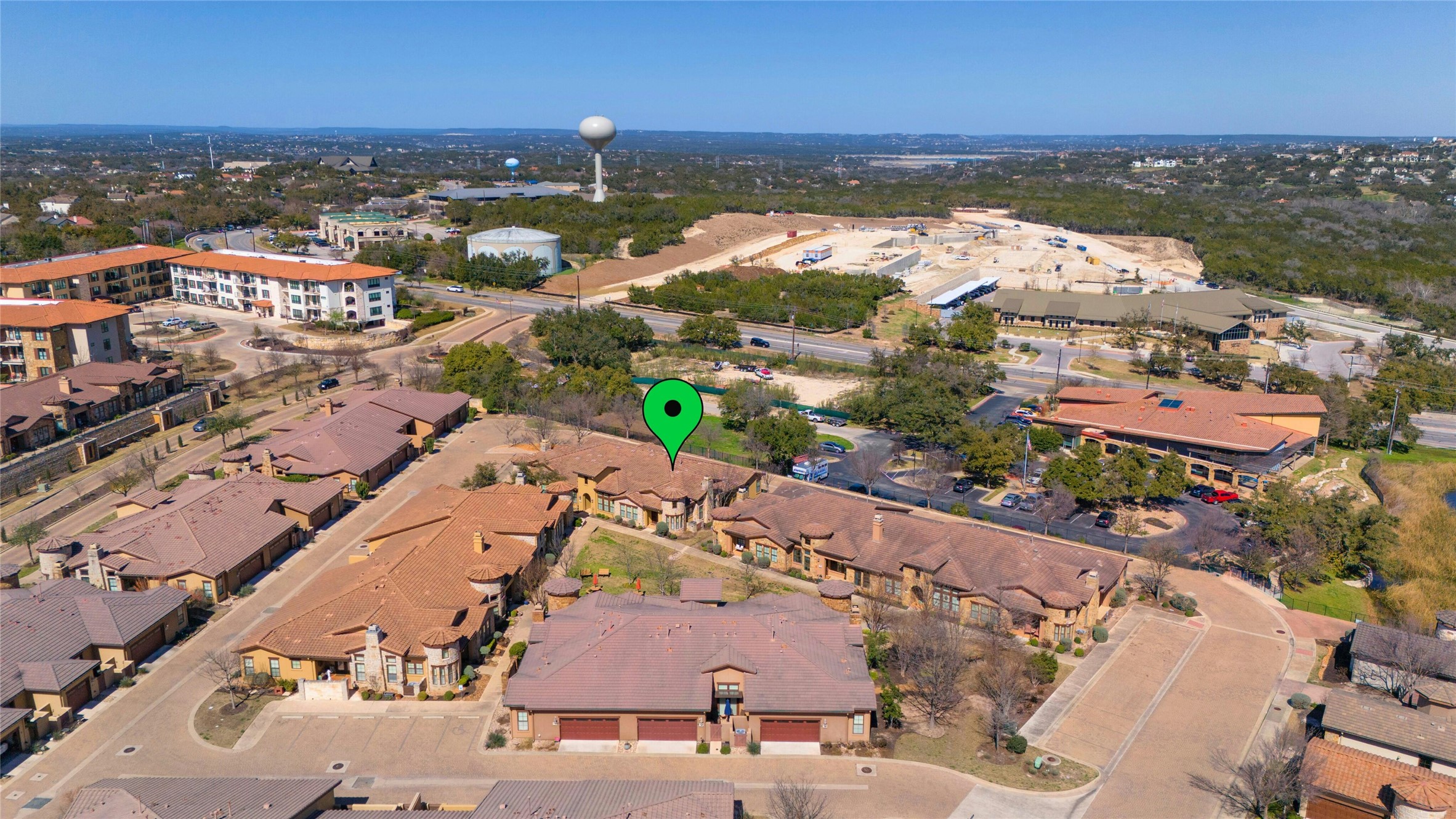 103 Rivalto Circle, Unit 3 Lakeway, TX 78734 - Photo 24 of 30 an aerial view of residential houses with outdoor space