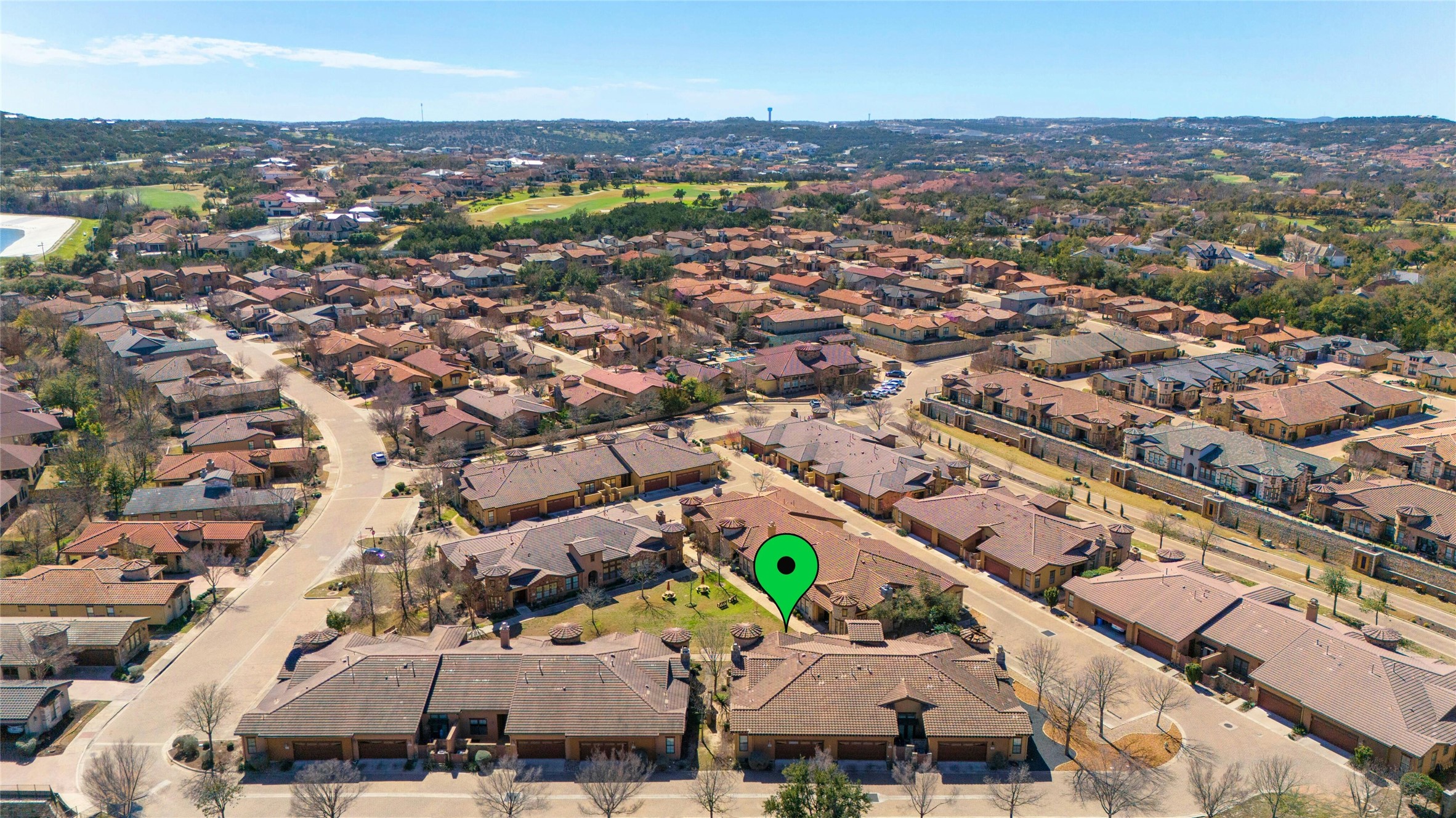 103 Rivalto Circle, Unit 3 Lakeway, TX 78734 - Photo 29 of 30 an aerial view of a city with lots of residential buildings