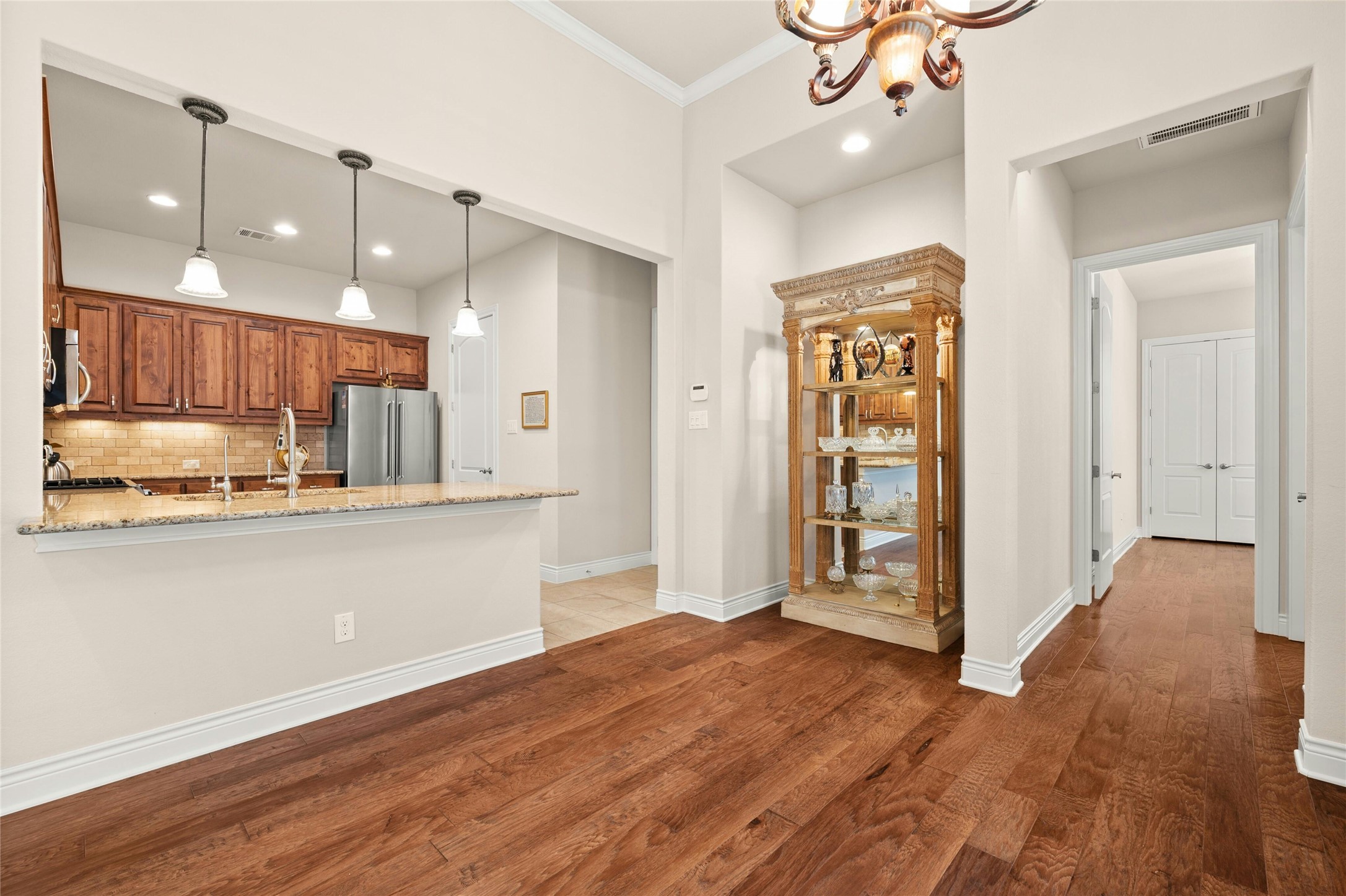 103 Rivalto Circle, Unit 3 Lakeway, TX 78734 - Photo 9 of 30 a view of kitchen with wooden floor