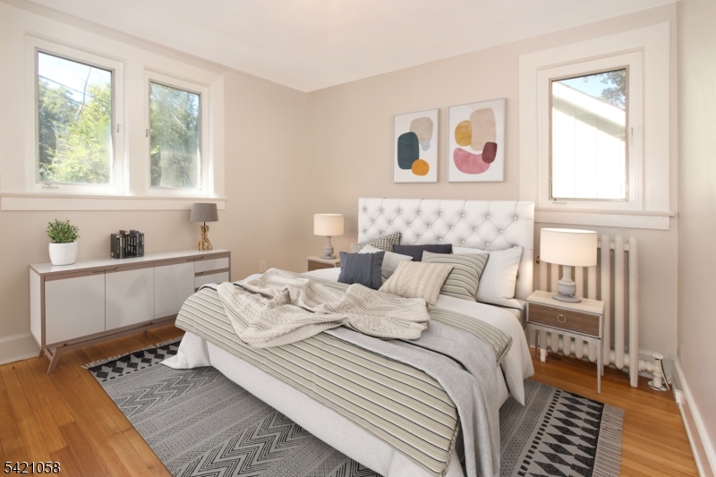 10 Lincoln Street Glen Ridge, NJ 07028 - Photo 4 of 28 a bedroom with a bed and a window
