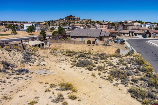 a view of a houses with a yard