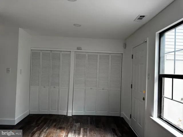 a view of small space with wooden floor