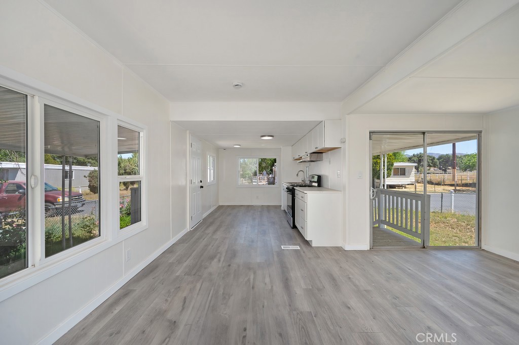 26455 Paradise Valley Road, Unit 86 Warner Springs, CA 92086 - Photo 16 of 34 a view of a living room hardwood floor and a kitchen