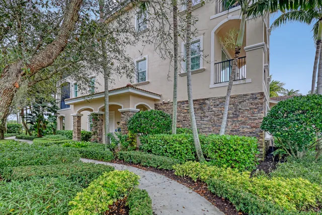 front view of a house with a garden