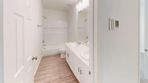 a bathroom with a sink and a bathtub