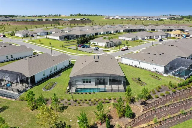 an aerial view of a house with a outdoor space