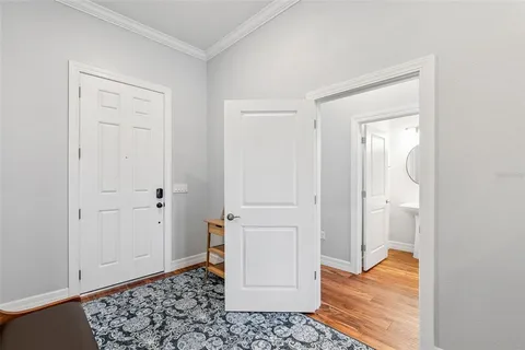 a view of a bathroom with wooden floor