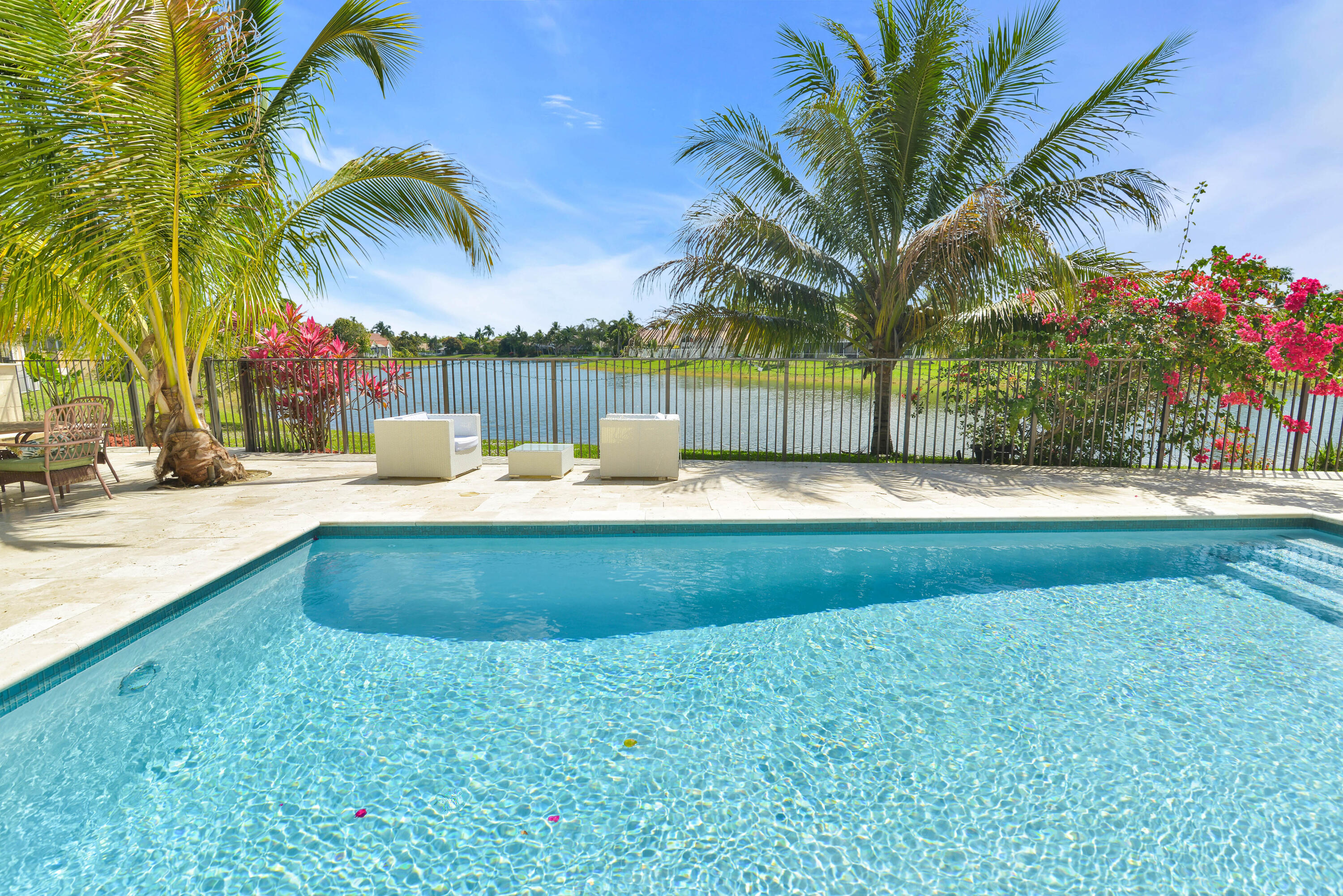 10900 Haydn Drive Boca Raton, FL 33498 - Photo 30 of 55 POOL AND LAKE