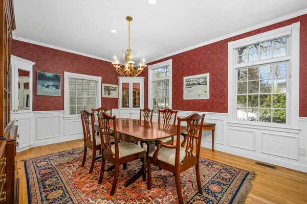 a large kitchen with stainless steel appliances granite countertop a large counter top and a stove