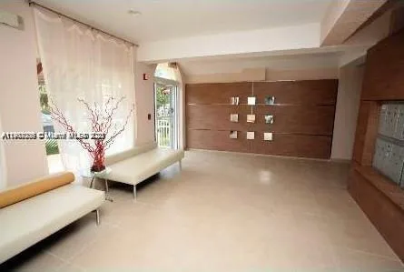 a view of livingroom with furniture and window