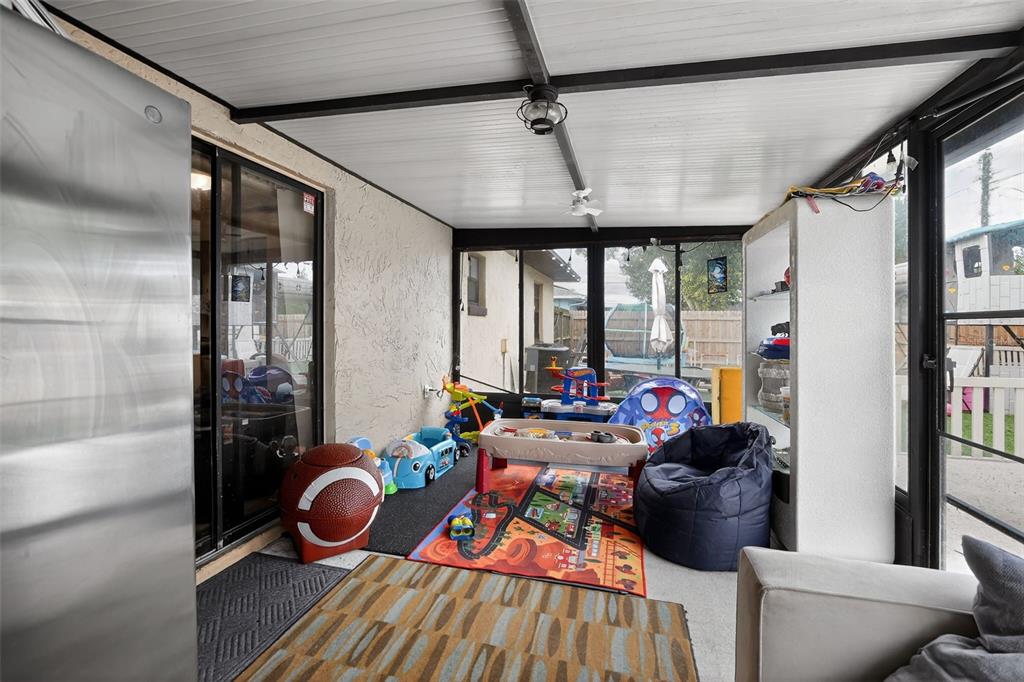 1644 Ruth Street Cocoa, FL 32926 - Photo 23 of 38 a view of a dining room with furniture wooden floor and next to a window